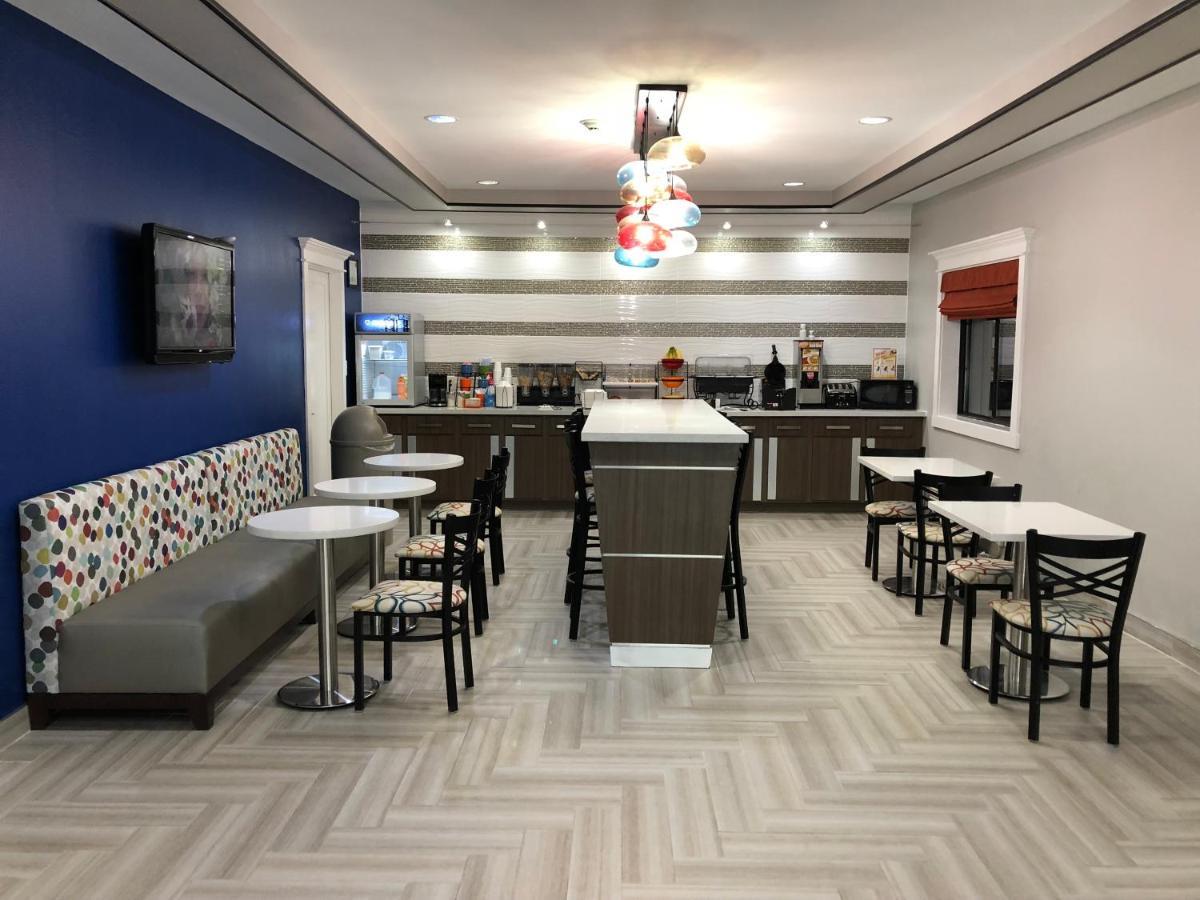 Executive Inn And Suites Joaquin Экстерьер фото