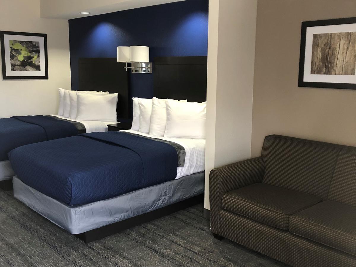 Executive Inn And Suites Joaquin Экстерьер фото