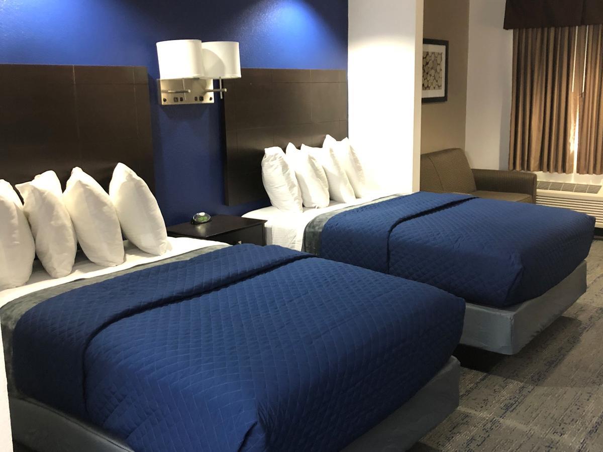 Executive Inn And Suites Joaquin Экстерьер фото