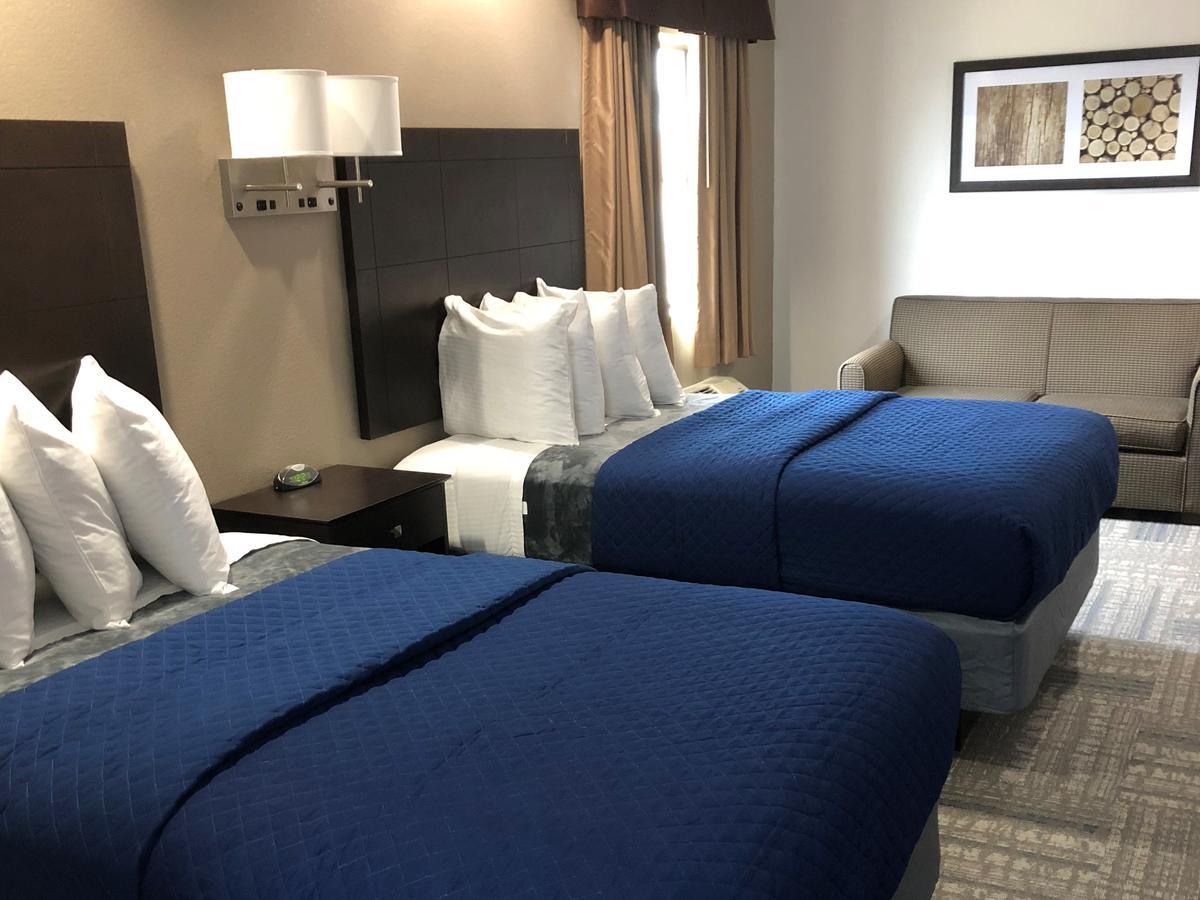 Executive Inn And Suites Joaquin Экстерьер фото